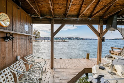 Enchanting lakefront oasis with fire pit, generous patio, dock, & amazing views