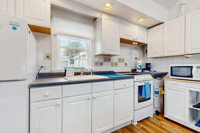 Ocean view getaway with a deck & shared yard - walk to the beach