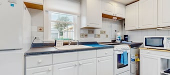 Ocean view getaway with a deck & shared yard - walk to the beach