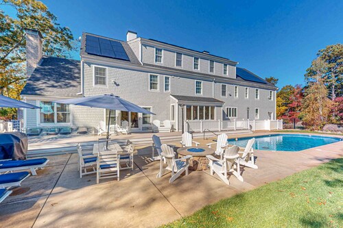 Sprawling dog-friendly lake estate with pool, patio, fire pit, games, & views