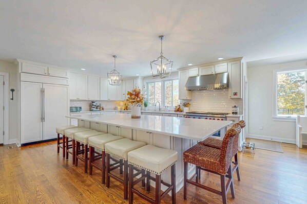 Fridge, microwave, oven, stovetop - Sprawling dog-friendly lake estate with pool, patio, fire pit, games, & views (Barnstable)