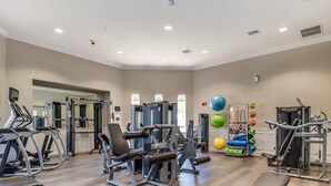 A gym with treadmills, weight machines, and exercise balls. - IS3-303 - At Vista Cay Resort - Orlando, fl 3BR (Orlando)
