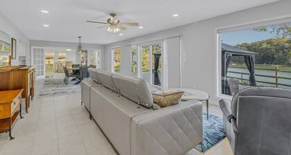 Spacious 1-level waterfront retreat w/ rec room, fenced yard. Big dogs welcome!