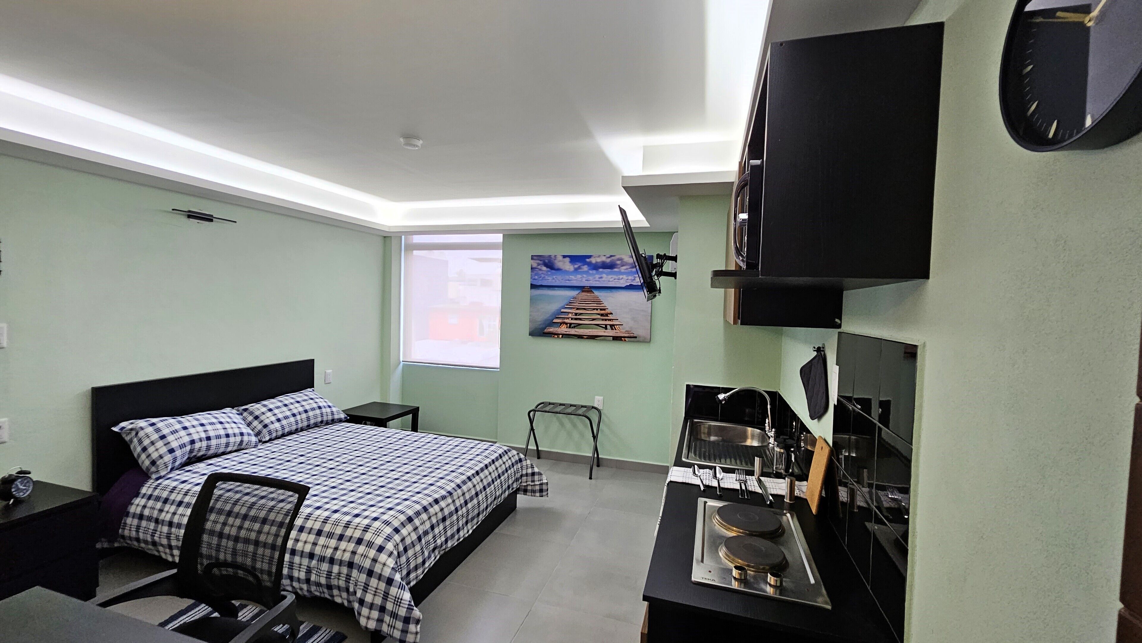 1 habitación, tabla de planchar con plancha, wifi y ropa de cama 