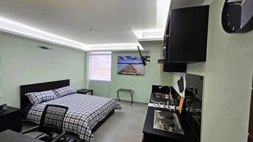 1 habitación, tabla de planchar con plancha, wifi y ropa de cama