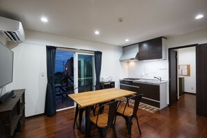 Deluxe Villa | Living area | 55-inch LCD TV with digital channels - Venus (Nakijin)