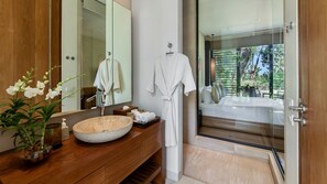 Luxury Villa | Bathroom | Rainfall showerhead, hair dryer, bathrobes, slippers