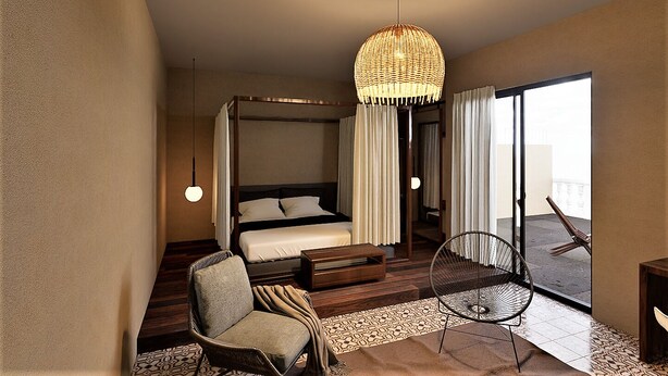 A bedroom with a four-poster bed, a wicker chair, a small table, and a balcony with a chair. - San Patricio Hotel Boutique (Mérida)