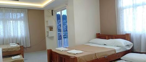 Family Room | 1 bedroom, individually furnished, bed sheets