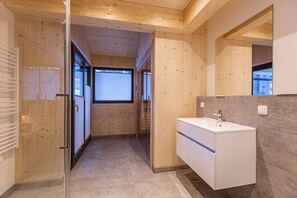 Shower, towels, toilet paper
