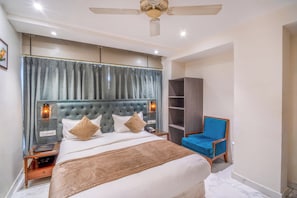 Habitación Deluxe | 1 dormitorio, ropa de cama de alta calidad, edredones de plumas