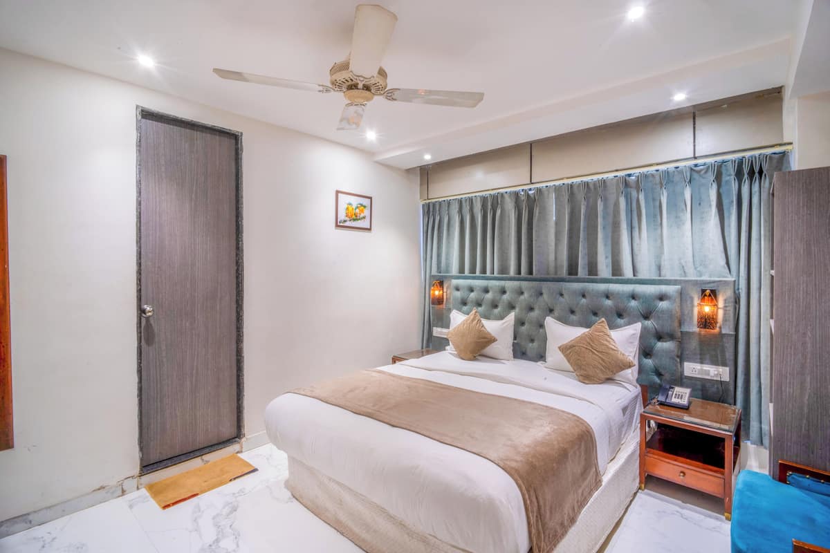 Habitación Deluxe | 1 dormitorio, ropa de cama de alta calidad, edredones de plumas