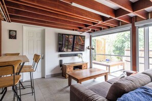 TV, fireplace - Captain's Haven - Oceanstays - Hot Tub & Pet Friendly (Yamba)