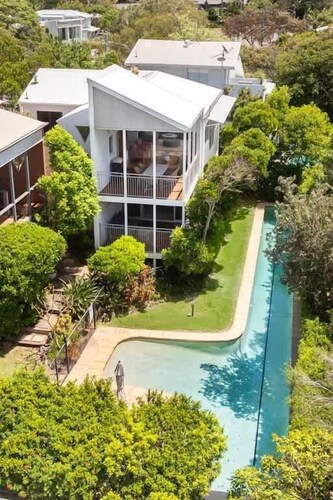 Tranquil Treetop Retreat with Pool and Ocean Views
