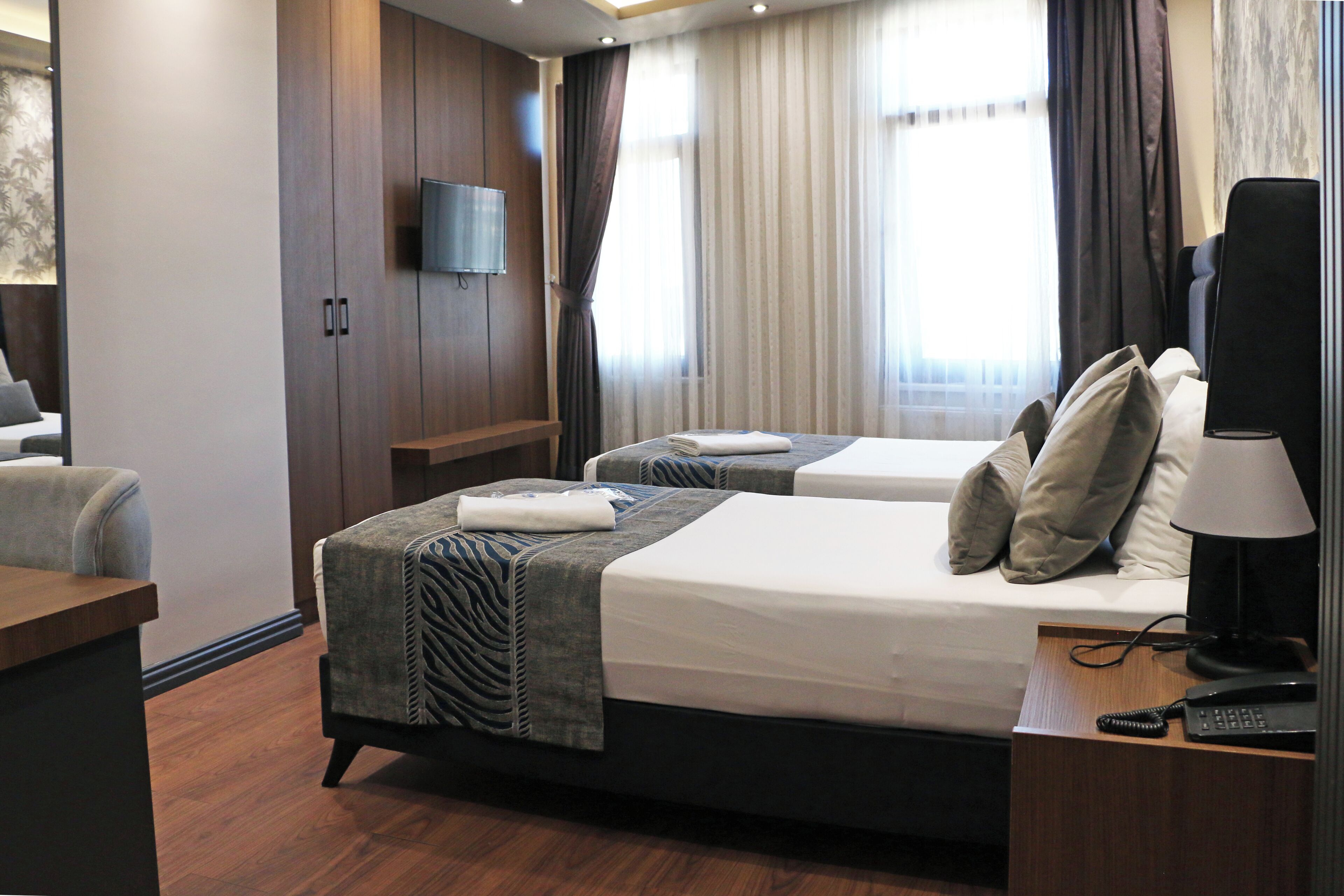 Tomannsrom – deluxe | Minibar, skrivebord, skrivebord for bærbar PC og lydisolert