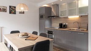 Apartment, 2 Bedrooms (Excl. 163 EUR cleaning fee) | Private kitchen - Der Gletscherblick by Alpin Rentals - incl Summercard  (Kaprun)