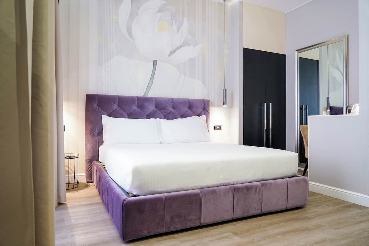 Tripla Junior | Biancheria da letto di alta qualità, copriletto in piuma, minibar