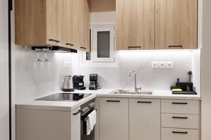 Fridge, oven, stovetop, coffee/tea maker - Chic & Renovated Retreat Steps from Metro Access (Athina)