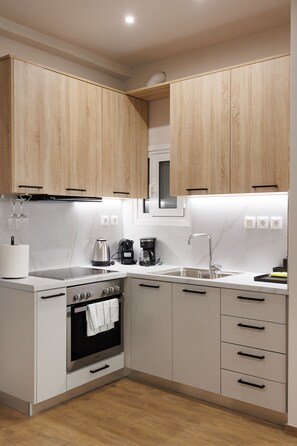 Fridge, oven, stovetop, coffee/tea maker - Chic & Renovated Retreat Steps from Metro Access (Athina)