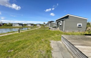 Enjoy lakeside relaxation in our cozy cabins with decks and easy access to the water.