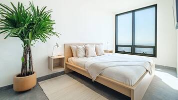 1 bedroom, desk, iron/ironing board, travel crib