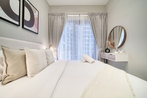1 chambre, coffre-fort, fer et planche à repasser