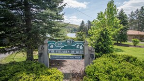 A sign for 'The Villages of Wisp' indicating a private recreational area.