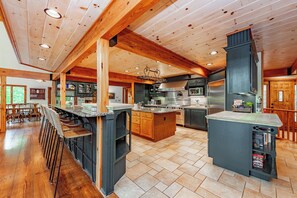 Fridge, microwave, oven, stovetop - Dog Friendly Lake Cove Chalet w/ Hot Tub & Games (McHenry)