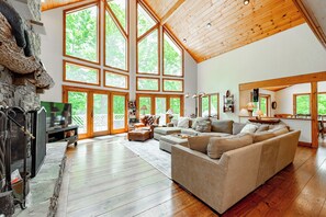 Smart TV, fireplace, DVD player, table football - Dog Friendly Lake Cove Chalet w/ Hot Tub & Games (McHenry)