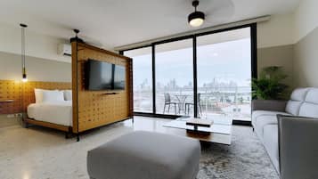 Comfort Apartment | Living area | 40-inch Smart TV with cable channels