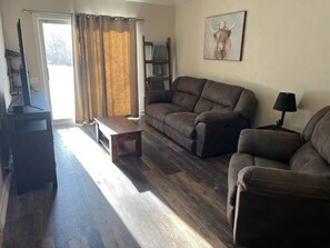 TV, fireplace - Cozy Tree-Area Home in Laramie (Laramie)