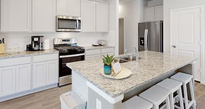 Brand-new, dog-friendly home with sunset views, private yard, patio, W/D & AC