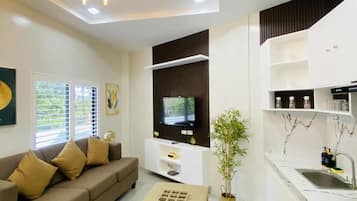 Premium Villa, Multiple Beds | Living area | 42-inch Smart TV with cable channels