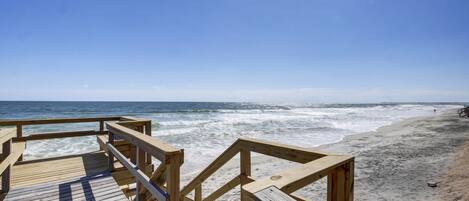 On the beach, sun loungers, beach towels