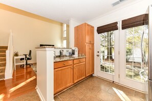 Fridge, microwave, oven, stovetop - Stylish Serenity - Spacious townhouse minutes from PTI and downtown Greensboro. (Greensboro)