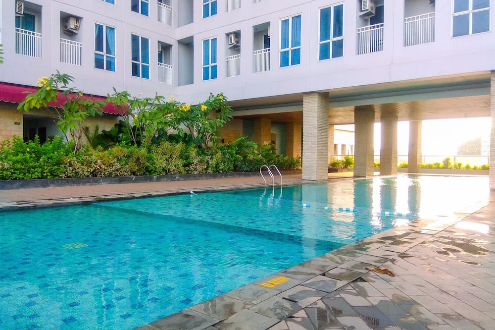 Minimalist And Comfy Studio At Grand Dhika City Apartment