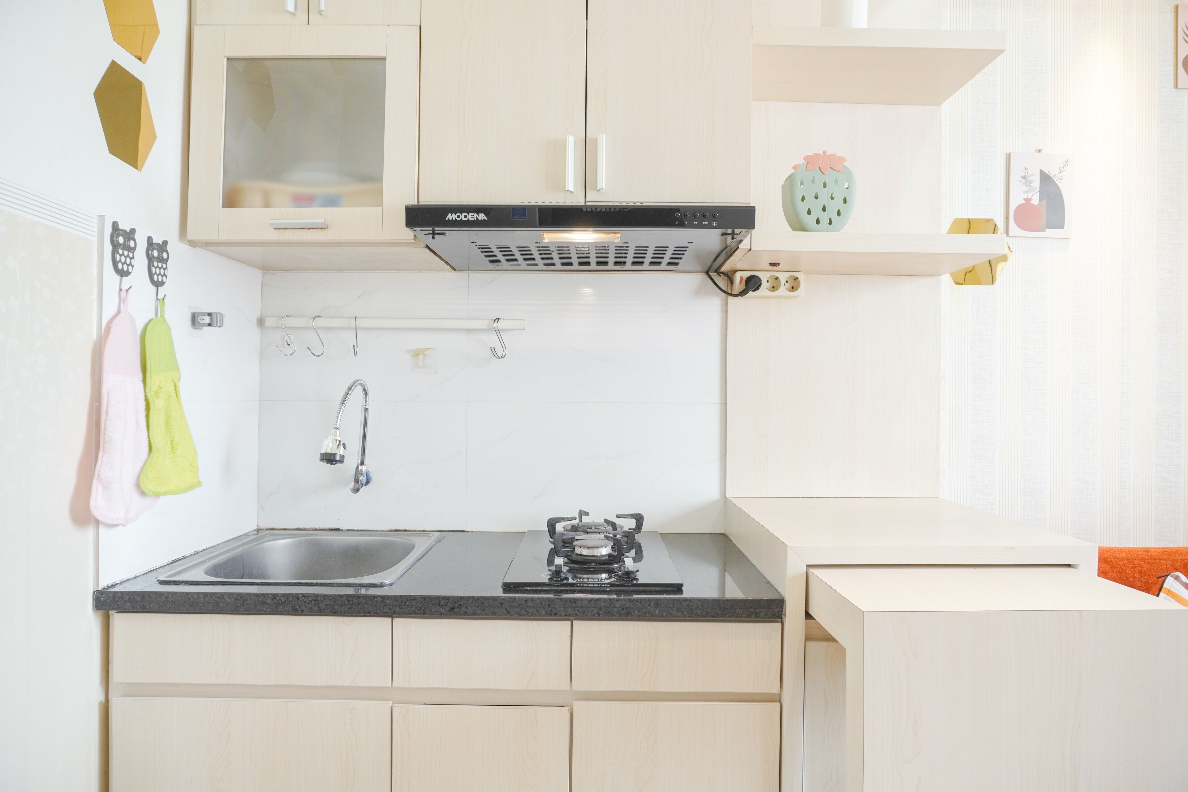 Apartamento | Cozinha privada | Geladeira grande, cooktop