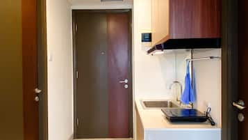 Apartment | Private kitchen | Full-size fridge, stovetop