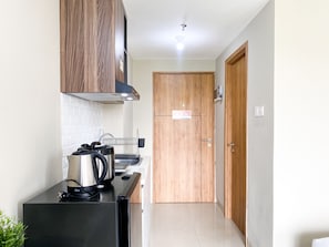 Private kitchen - Modern Studio at LRT City Jatibening Apartment (Bekasi)