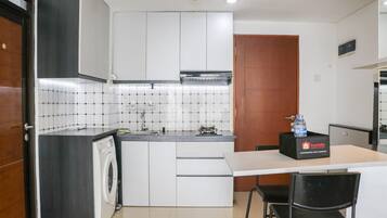 Apartment | Private kitchen | Full-size fridge, stovetop