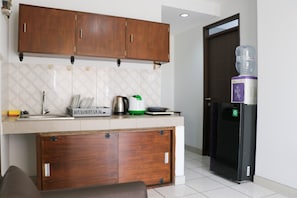 Apartment | Private kitchen | Full-sized fridge, stovetop - Cozy 2Br At Mekarwangi Square Cibaduyut Apartment (Bandung)