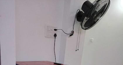 Spacious 2BHK apartment with Air Conditioner and attached bathroom with Parking