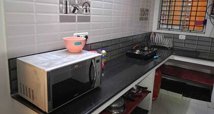 Spacious 2BHK apartment with Air Conditioner and attached bathroom with Parking