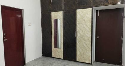 Spacious 2BHK apartment with Air Conditioner and attached bathroom with Parking