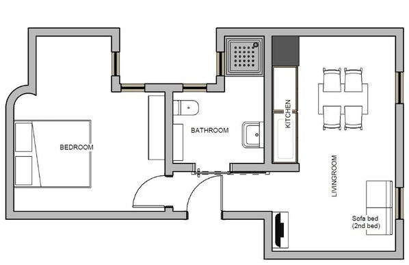 A floor plan of a hotel room with a bedroom, bathroom, kitchen, and living room. - Lightly, central and quiet apartment (Barcelona)