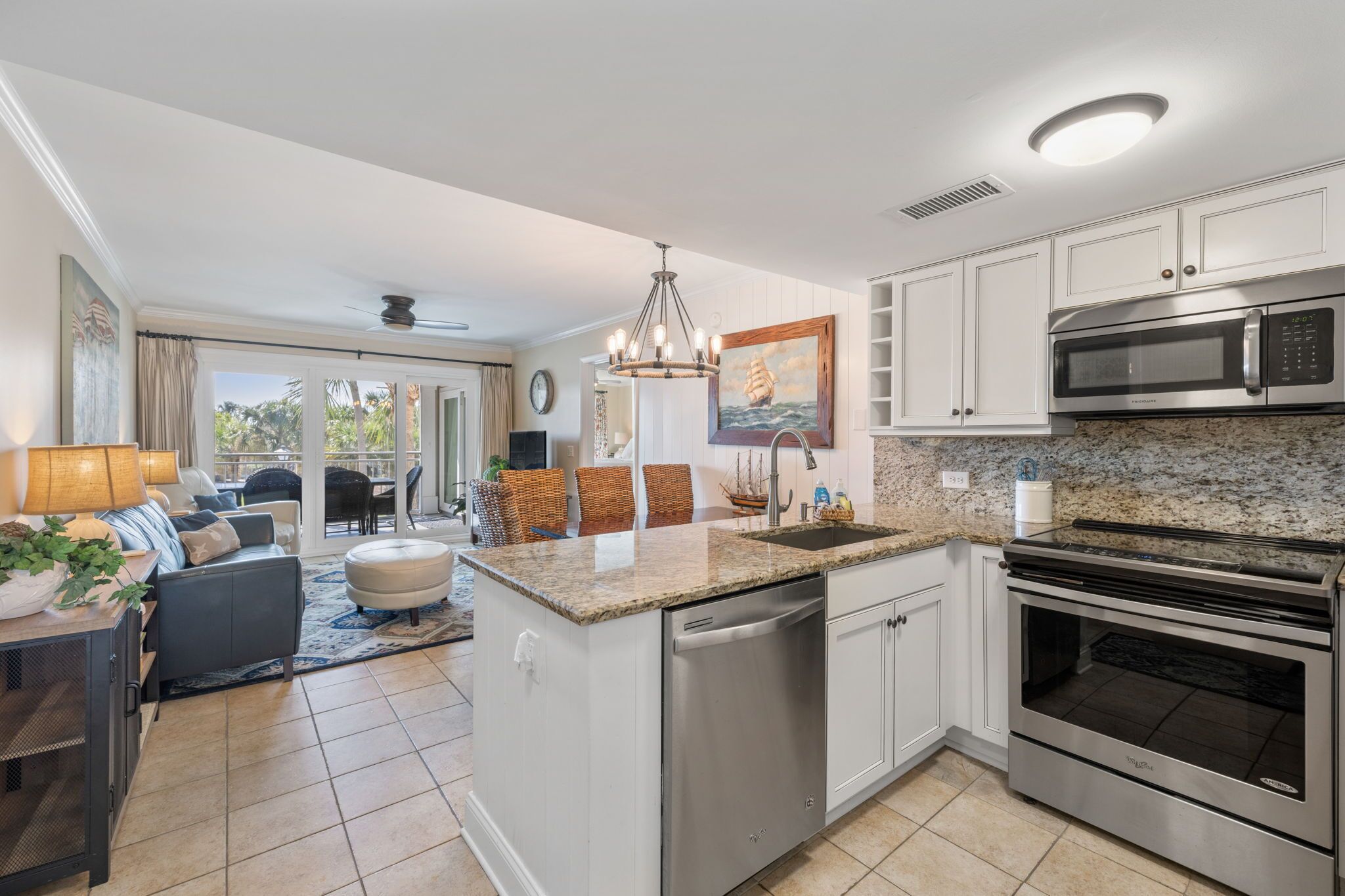 Beach Villa with relaxing patio and steps to all the amenities!