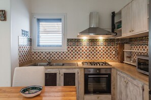 Fridge, microwave, oven, cookware/dishes/utensils