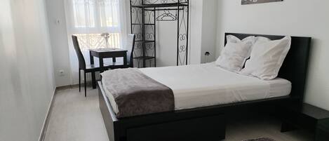 2 habitaciones y ropa de cama