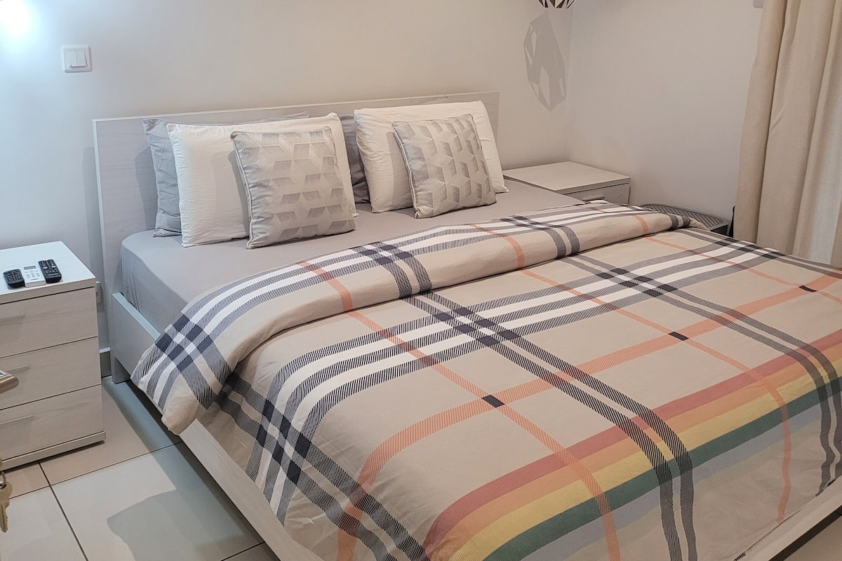 Comfort Apartment, 1 Bedroom, Pool View | 1 bedroom, free minibar items, iron/ironing board, free WiFi