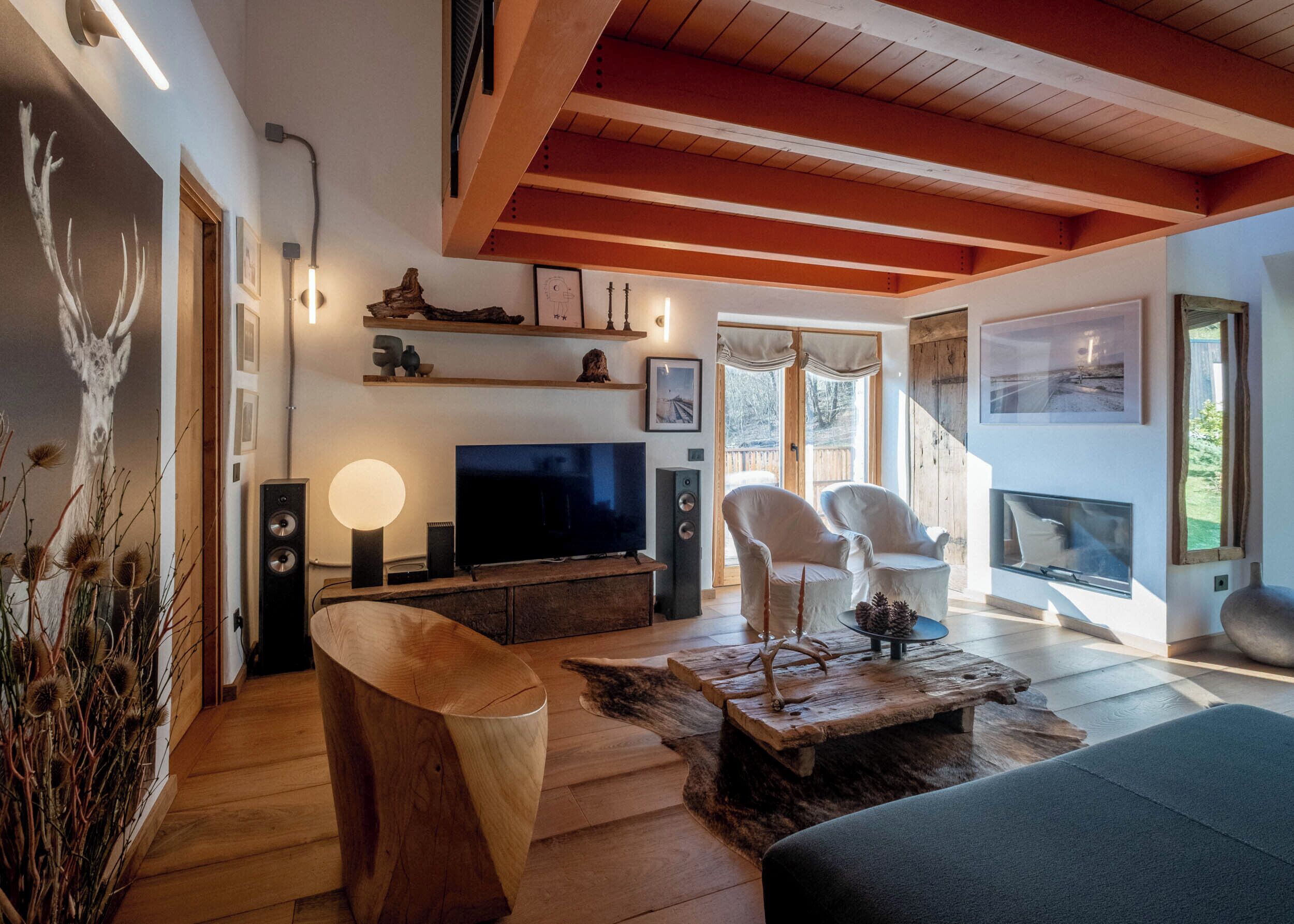 Design Chalet | Living area | 40-inch Smart TV with satellite channels, MP3 dock